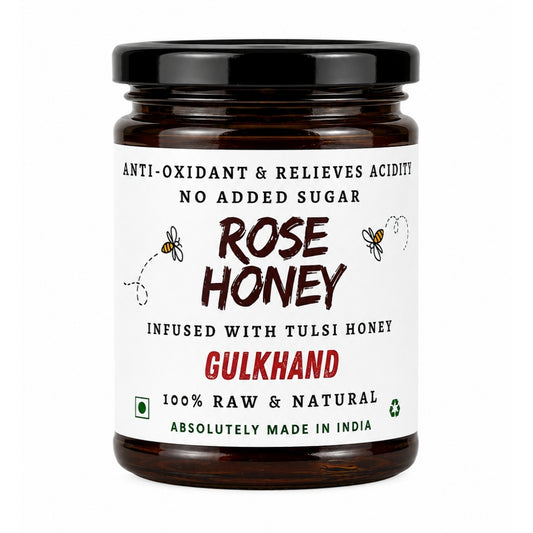 Unrefined rose petal honey gulkhand in a jar, natural sweetener from NEUTRIFARM, showing the golden honey with rose petals.